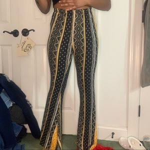Black and yellow flare leg pants